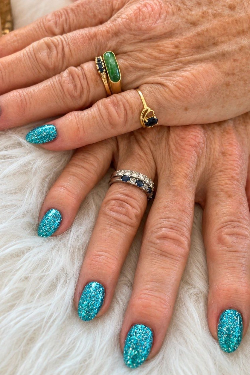 Turquoise glitter nails for older women