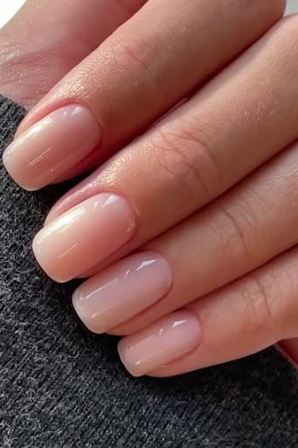 Pearly Nude Almond Nails with Gold Rings - flattering nail polish shade that hides veins for women over 50