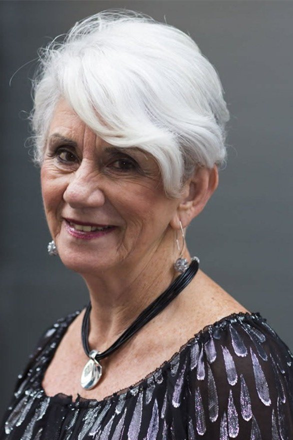 White pixie, front view, smiling - wispy hairstyle for women over 40