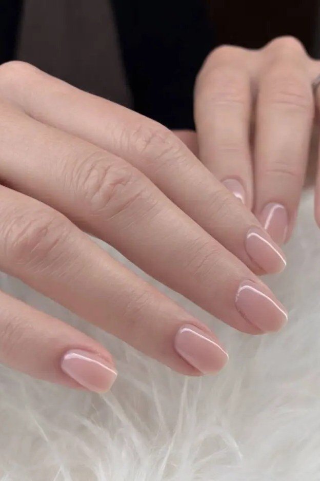 short squoval, pale pink, two hands , for women over 60