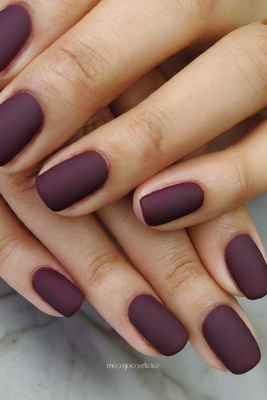 Matte plum burgundy almond nails for women over 50