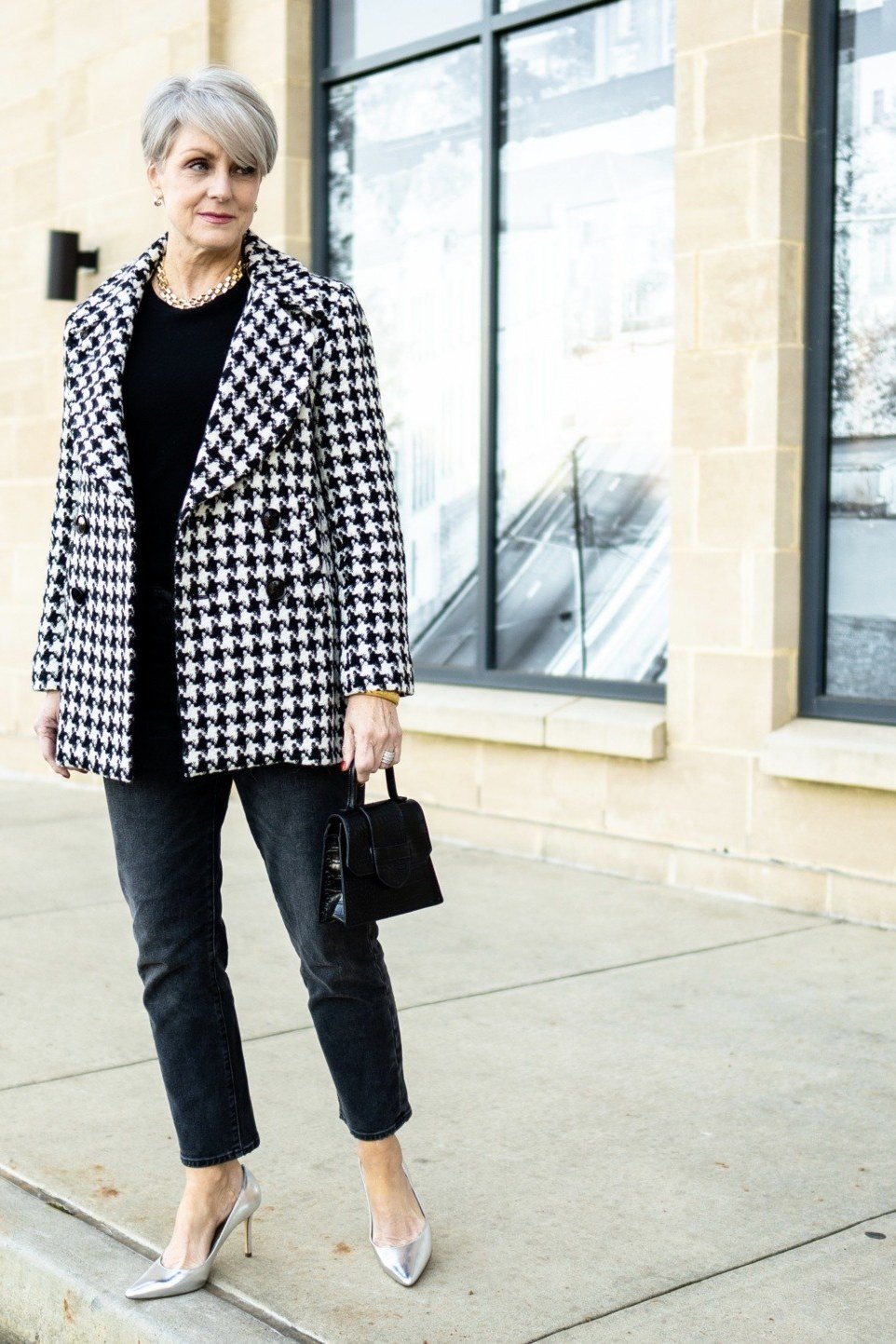 Gingham blazer with black top and trousers for women over 60