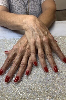 Nude marble effect sophisticated - flattering nail design for older women