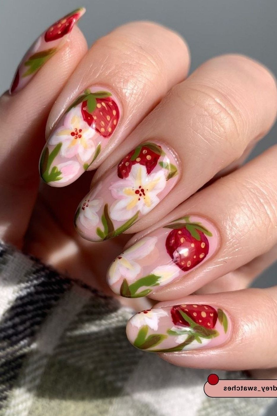 Almond glossy pink nails with strawberry floral art