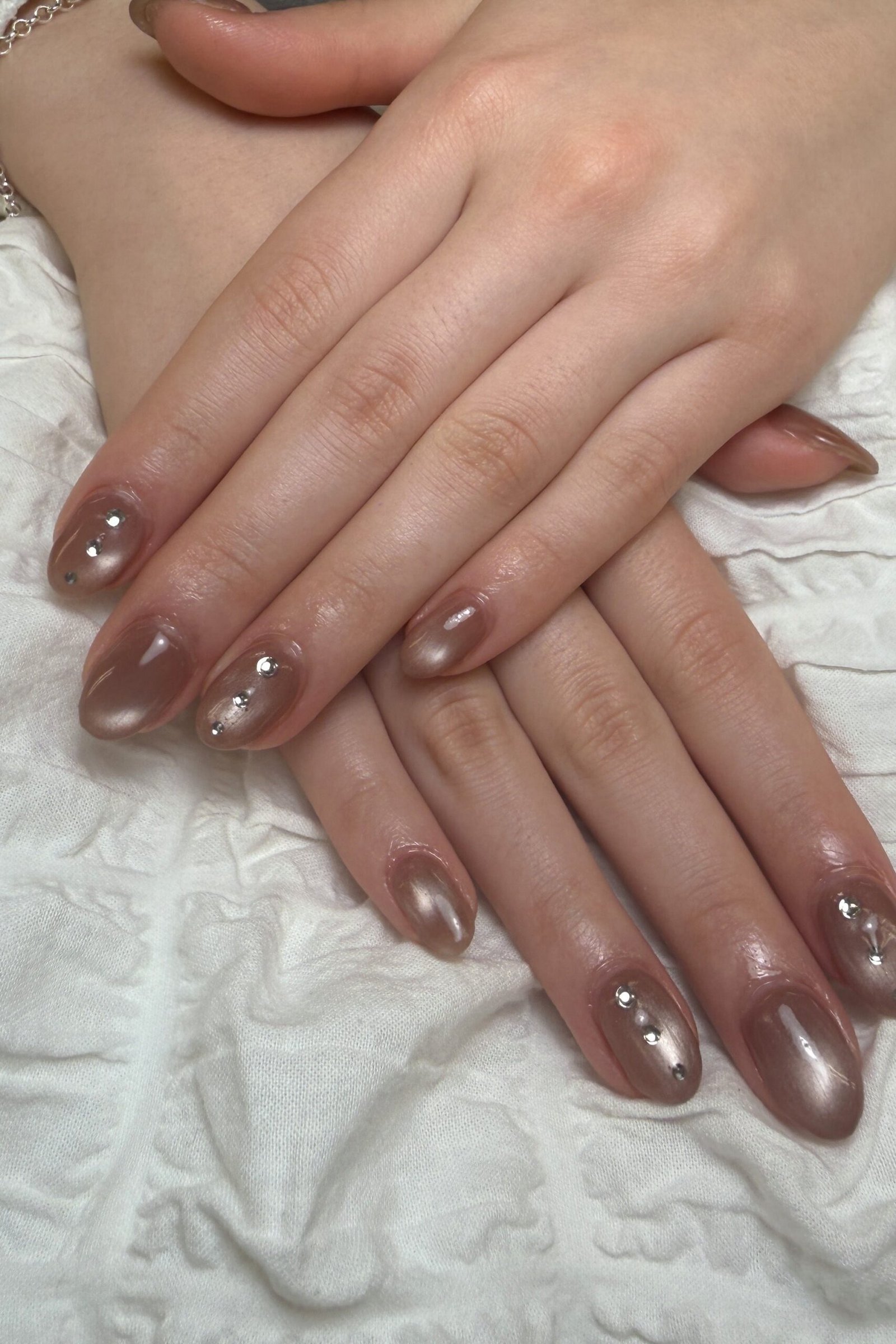 Sheer Brown Glazed Almond Nails for women over 60
