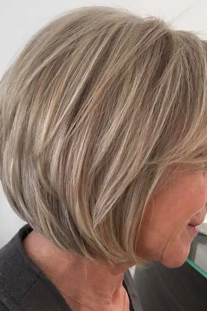 38. Ash Blonde Stacked Bob - wash and wear hairstyle for older women