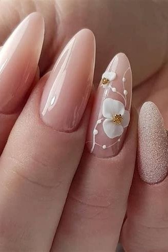 Nude Stiletto with White Floral nail design for women over 40
