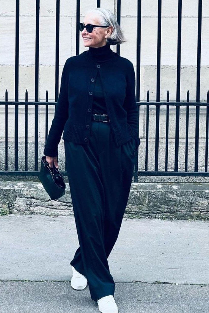 navy turtleneck with navy wide trousers and white sneakers for women over 50