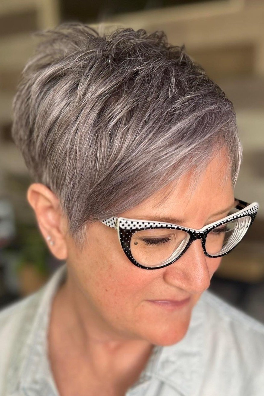 Grey pixie with glasses, front view - wispy hairstyle for women over 40