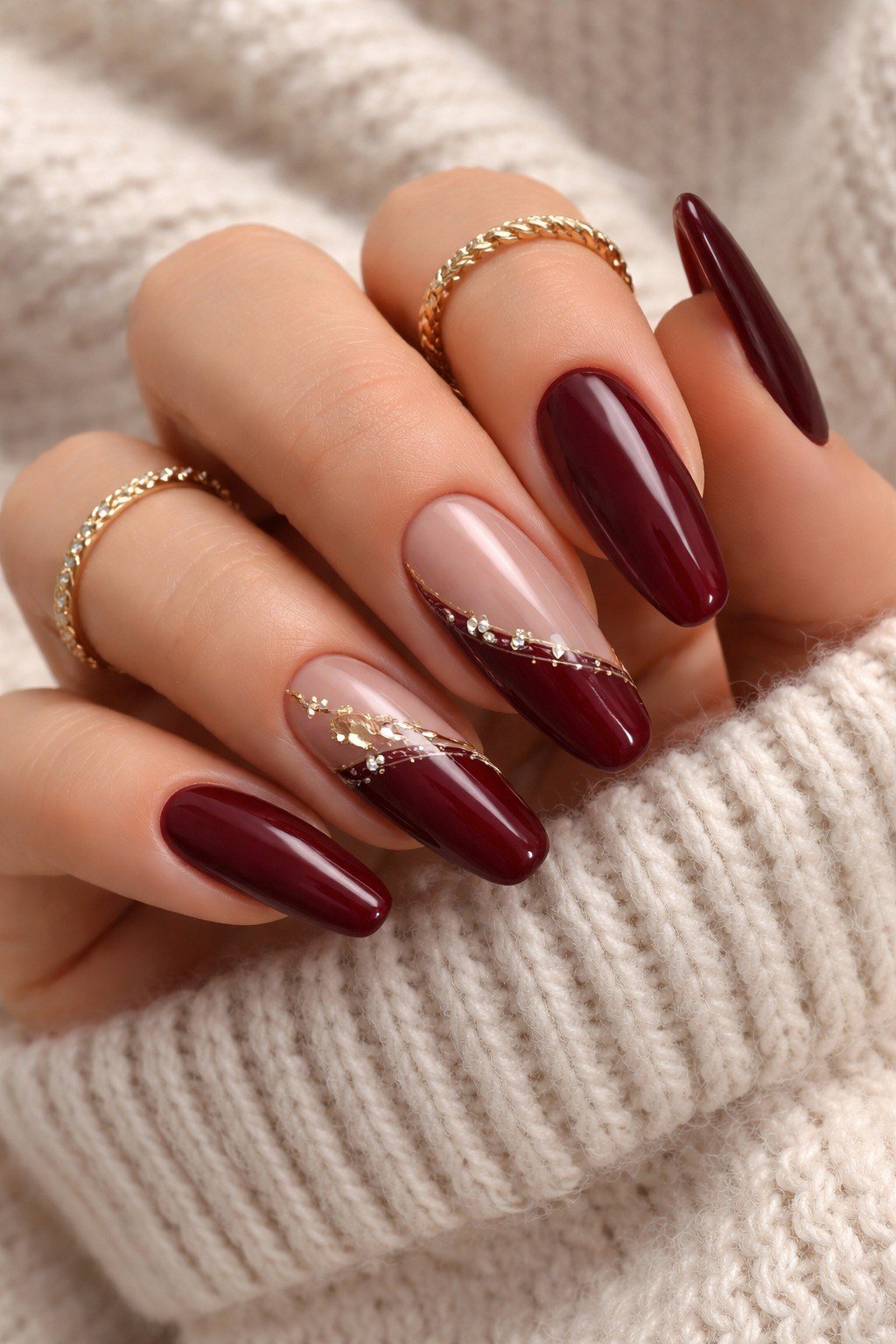 Burgundy with gold glitter tip accent almond, elegant fall nail design for women over 40
