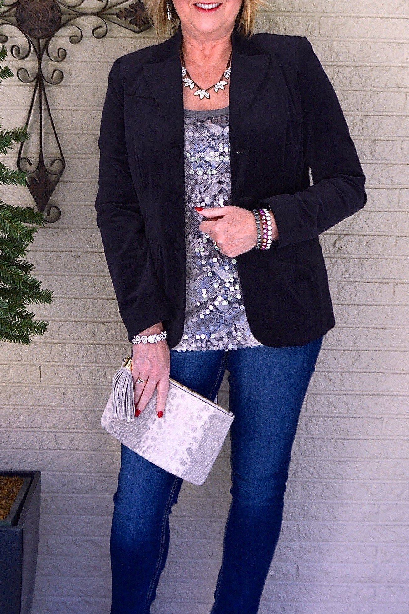 Leopard Bomber with a Black Turtleneck - fall outfit idea for women over 50