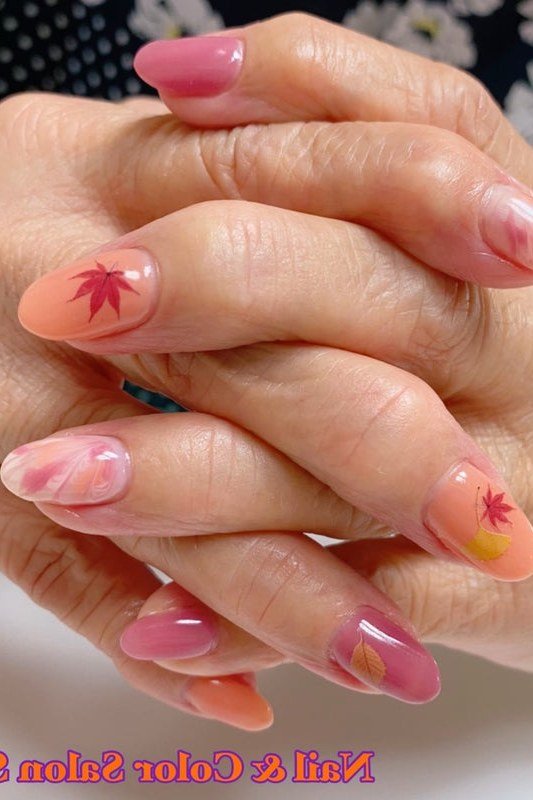 Pink nails with red maple leaf fall nail art