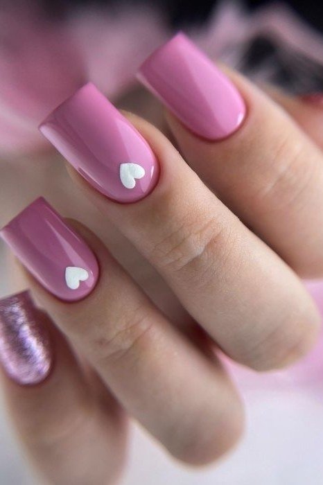 Dusty Pink with Heart Accent - elegant nail art idea for mature hands, women over 50