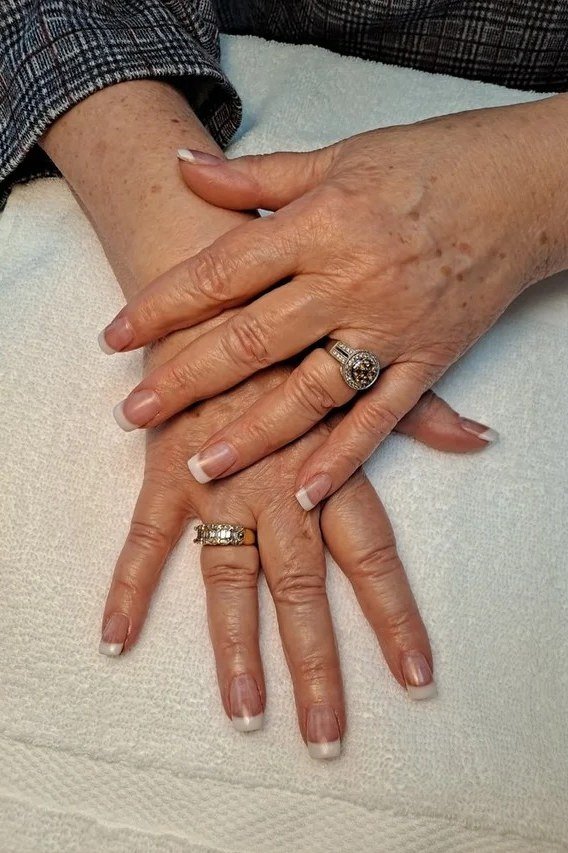 French with a Checkered Sleeve - short French nails for women over 60