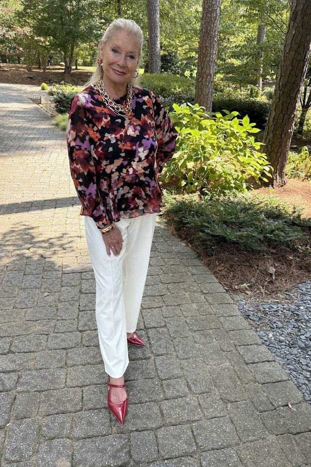 floral puff sleeve top white wide leg trousers pink pointed heels women over 50
