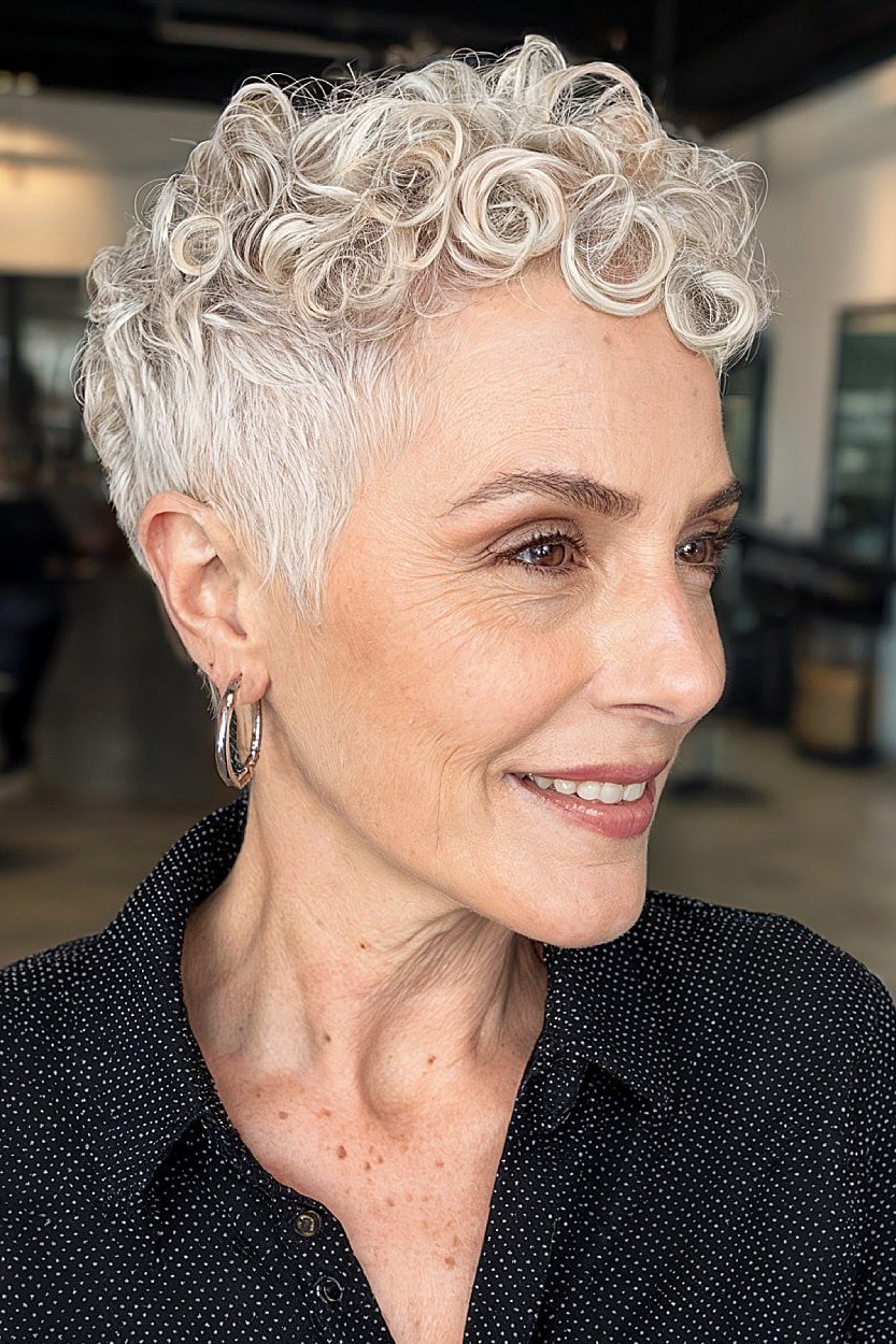 White curly pixie side view, smiling - curly hairstyle for women over 60