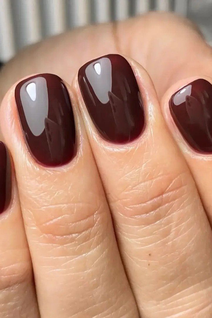 Burgundy Rounded Gloss - short nail design for women over 60 that makes nails look longer