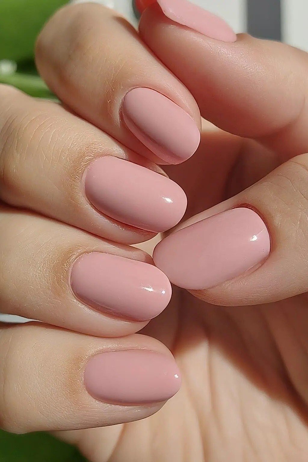 dusty rose glossy almond nails