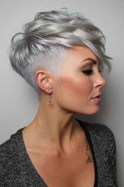 Edgy Grey Pixie with Ink - bold edgy pixie haircut for women over 50