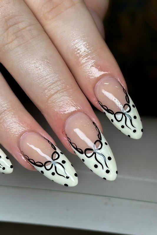 White nails with black lace bow art for older women