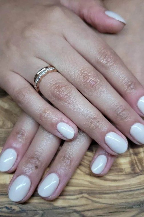 Crisp White Short Nails for women over 60
