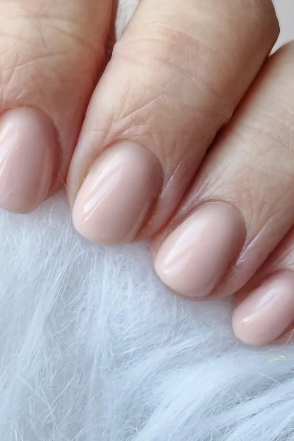 Featherlight milky pink gel nails