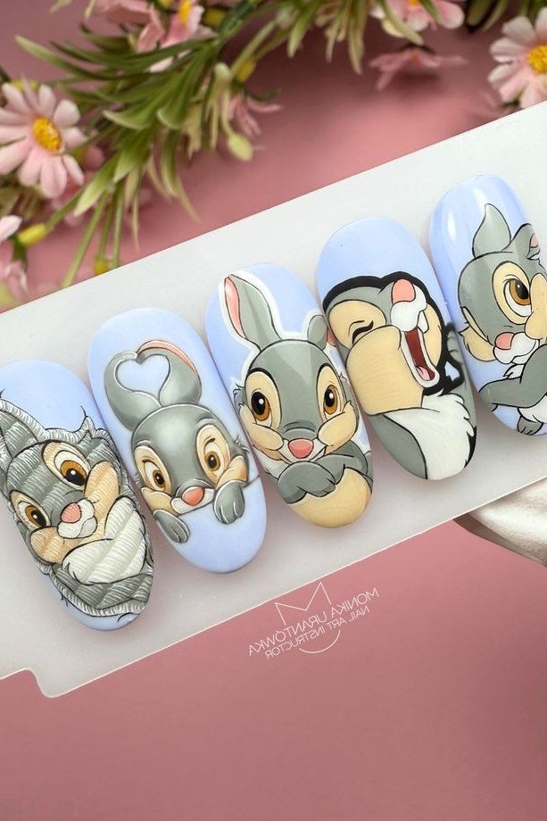 Pink yellow and blue gradient nails with Bambi character portraits