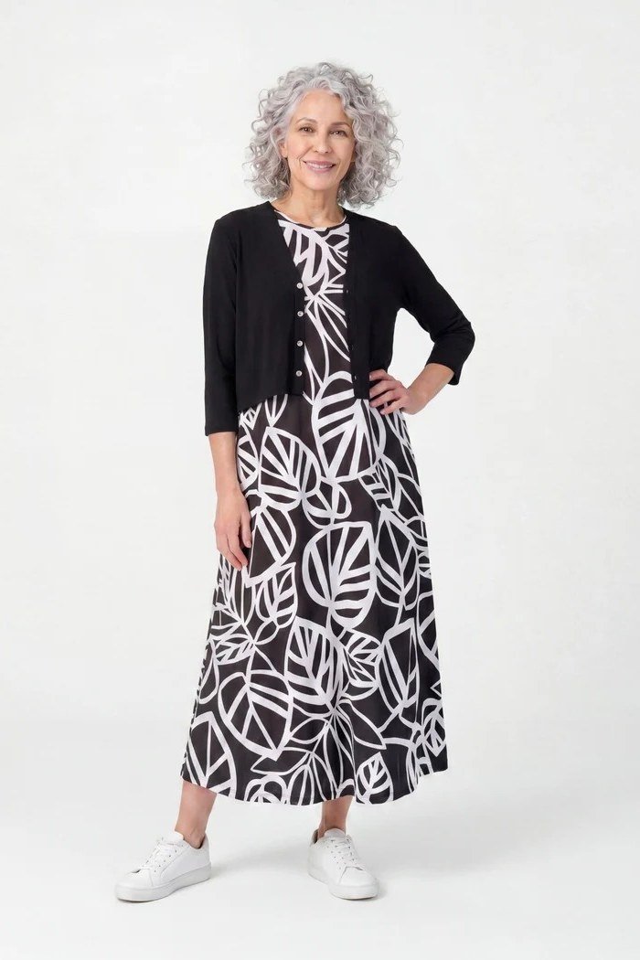 black and white leaf print dress with black cardigan for women over 60