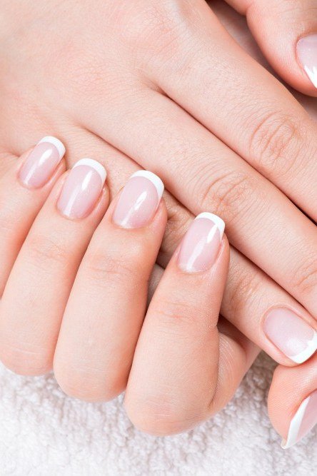 White French Oval Nails - elegant nail art idea for mature hands, women over 50