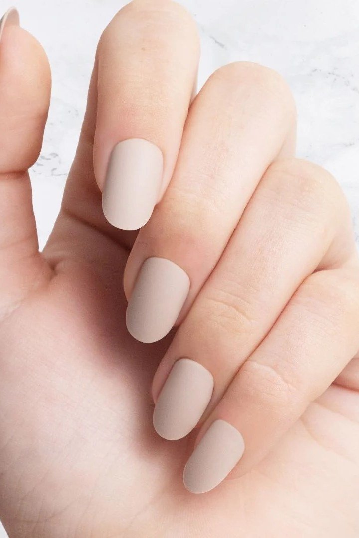 Matte Beige Nude Medium Almond - elegant nude nail design for women over 60