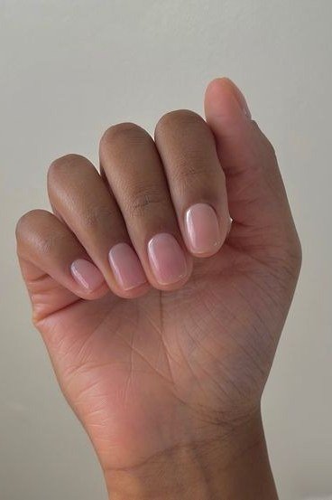 Pale Pink Sheer, Open Palm - short nude nail idea for women over 50