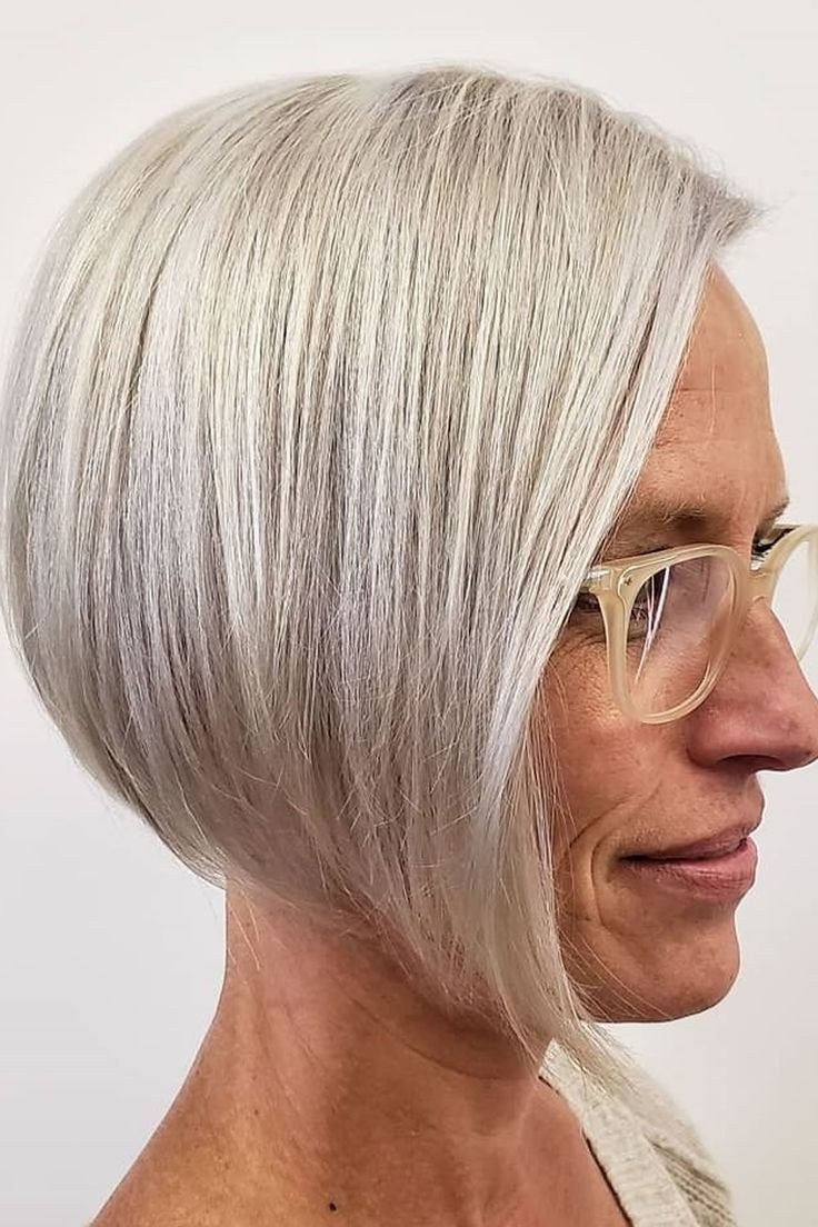 Sleek grey bob haircut for women over 70, side view