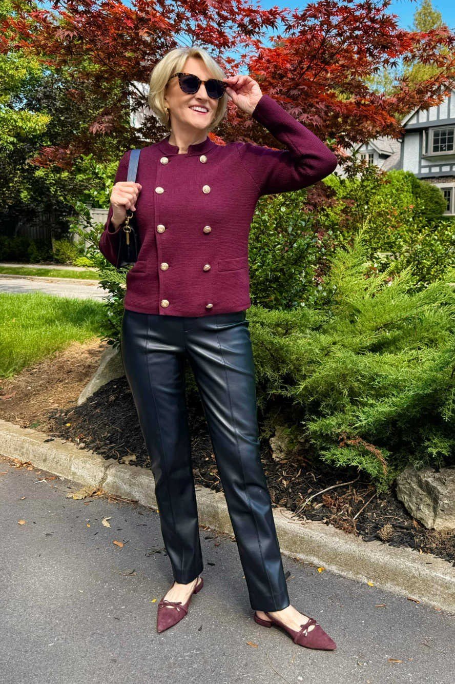 plum military style jacket black leather look pants burgundy flats women over 50
