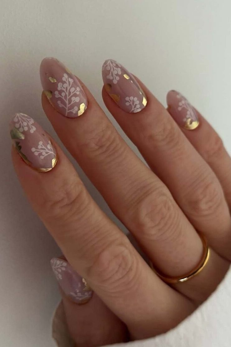 Sheer Nude with White Floral and Gold gel nails for women over 60