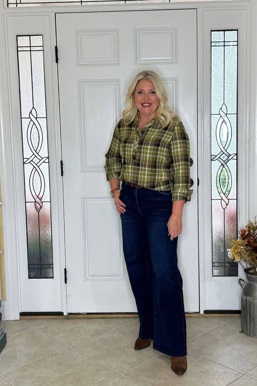 Green Plaid Shirt with Dark Flared Jeans on a woman over 50, fall outfit idea