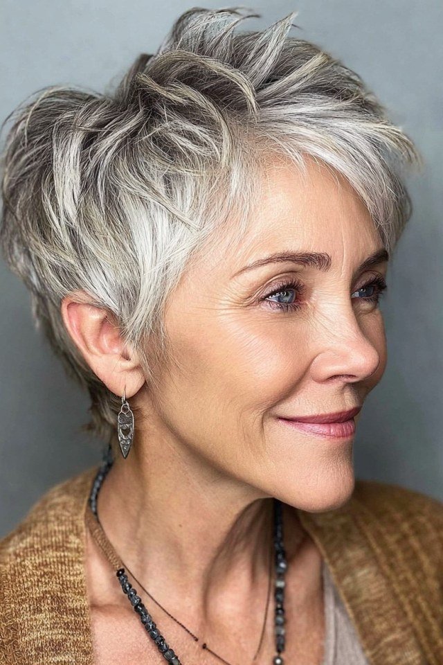 dark pixie with full crown volume for women over 50 front view