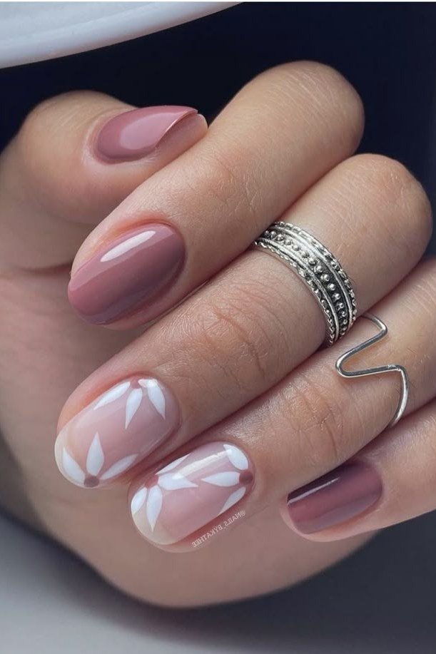Mauve Nails with White Florals and Silver Rings, elegant mauve nail idea for women over 60