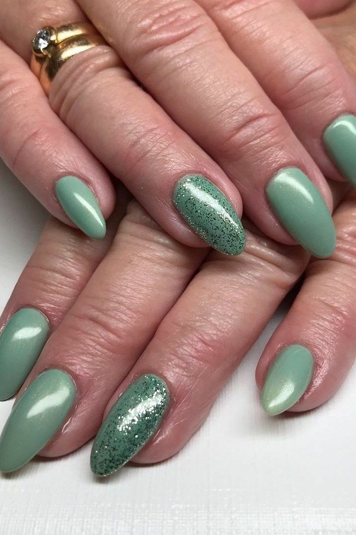 Teal green metallic nails on older hands, best manicure idea for women over 60