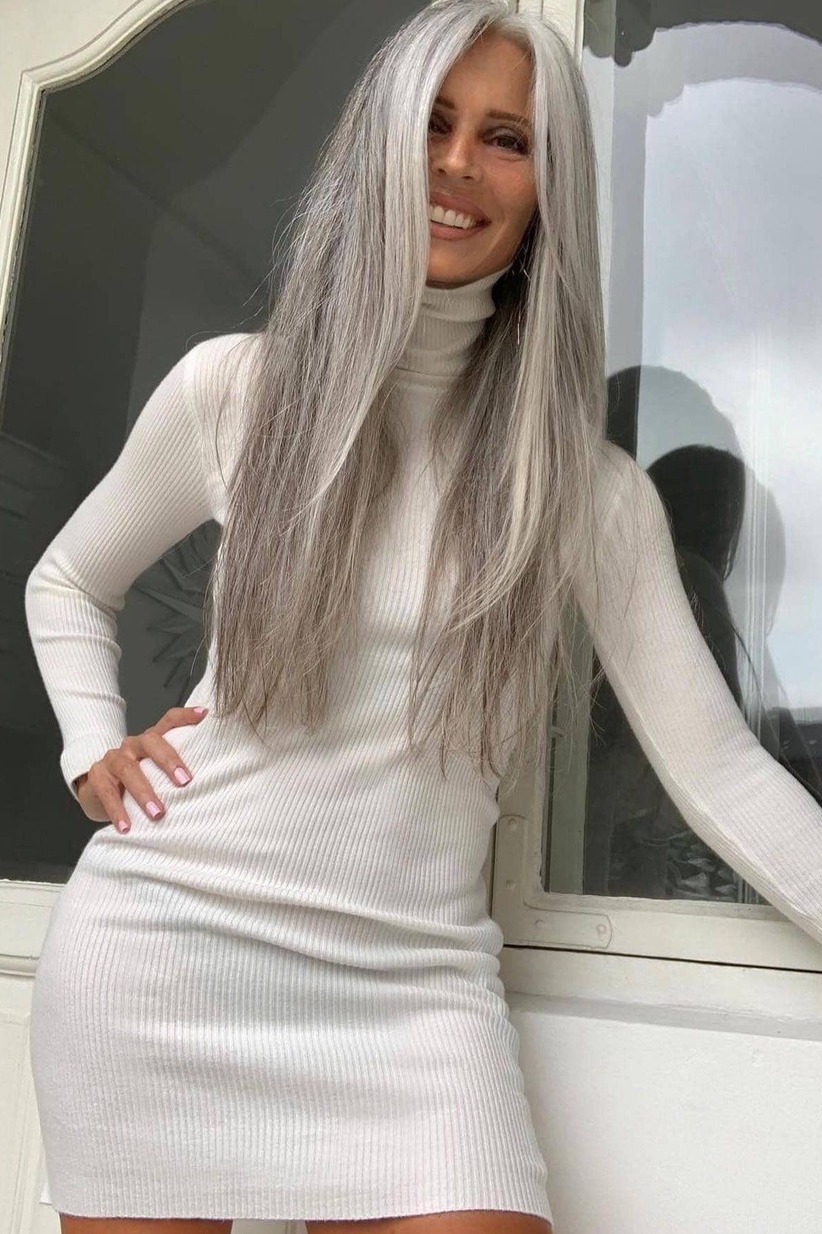 Extremely long straight silver hair for women over 50