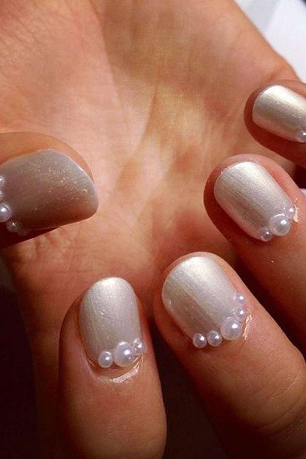 Silver Chrome Nails with Pearl Cuticle Dots - pearl finish nail idea for women over 60