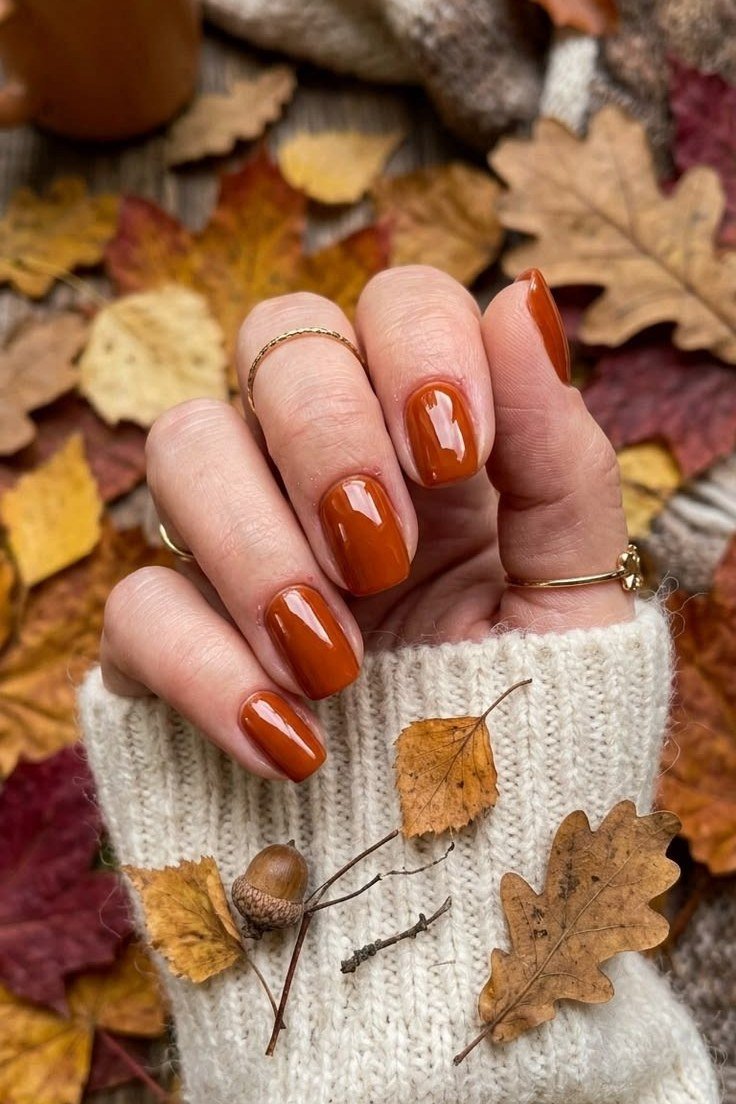 Burnt Orange Short Nails with Fall Leaves, fall nail color idea for women over 50