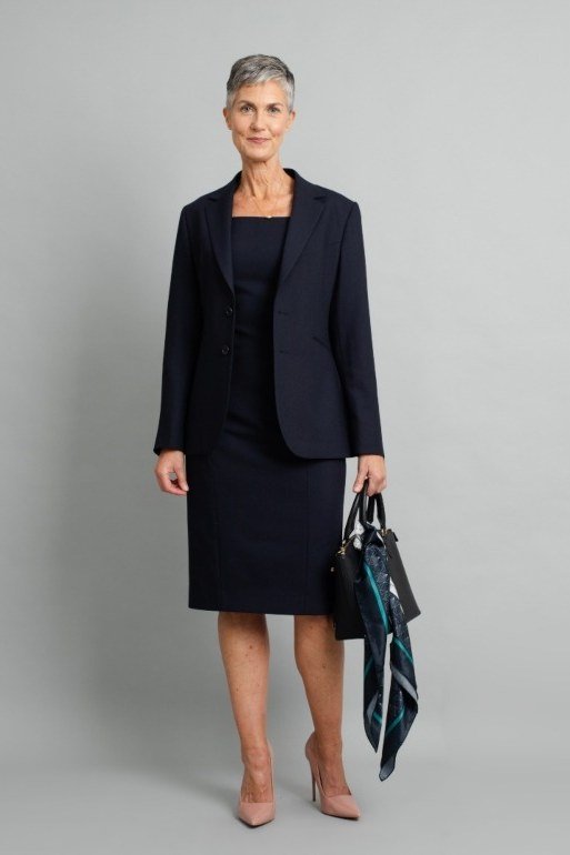 Navy Skirt Suit with Gray Background - business outfit for women over 50