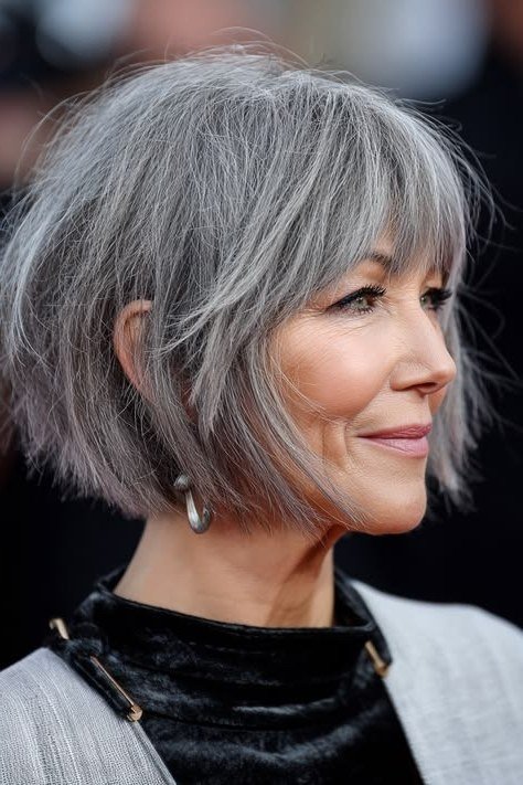Wavy Silver Shoulder Bob - grey shoulder length hairstyle for women over 60