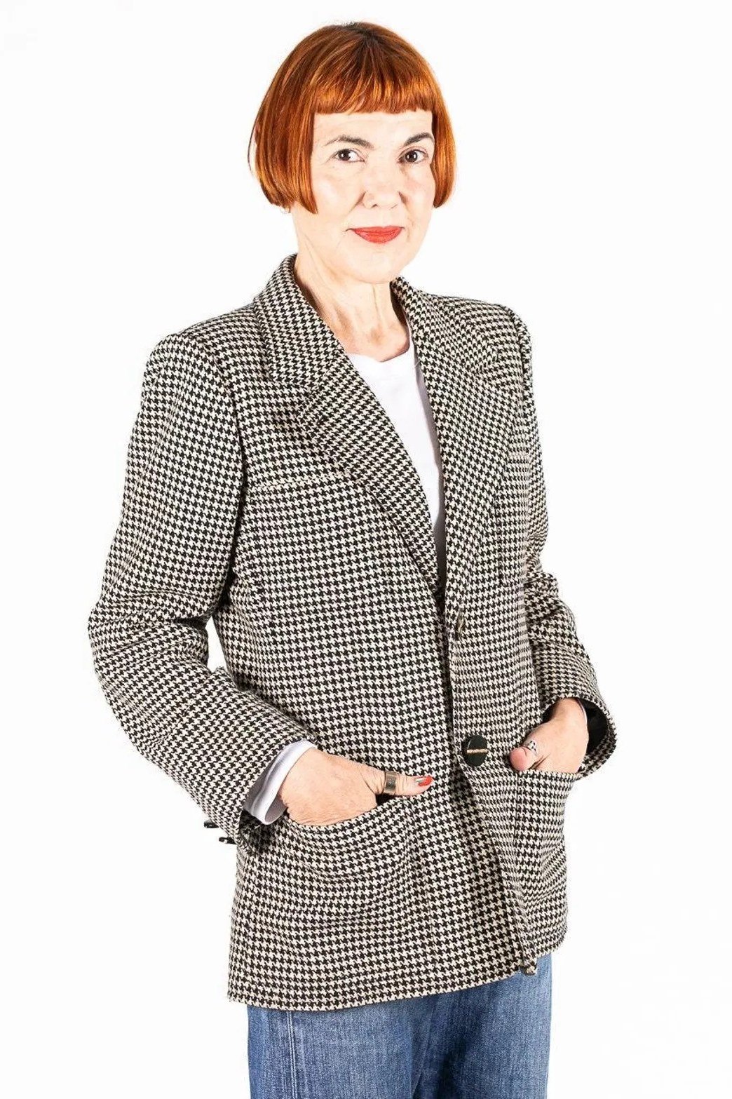 Houndstooth blazer with white top and jeans for women over 60