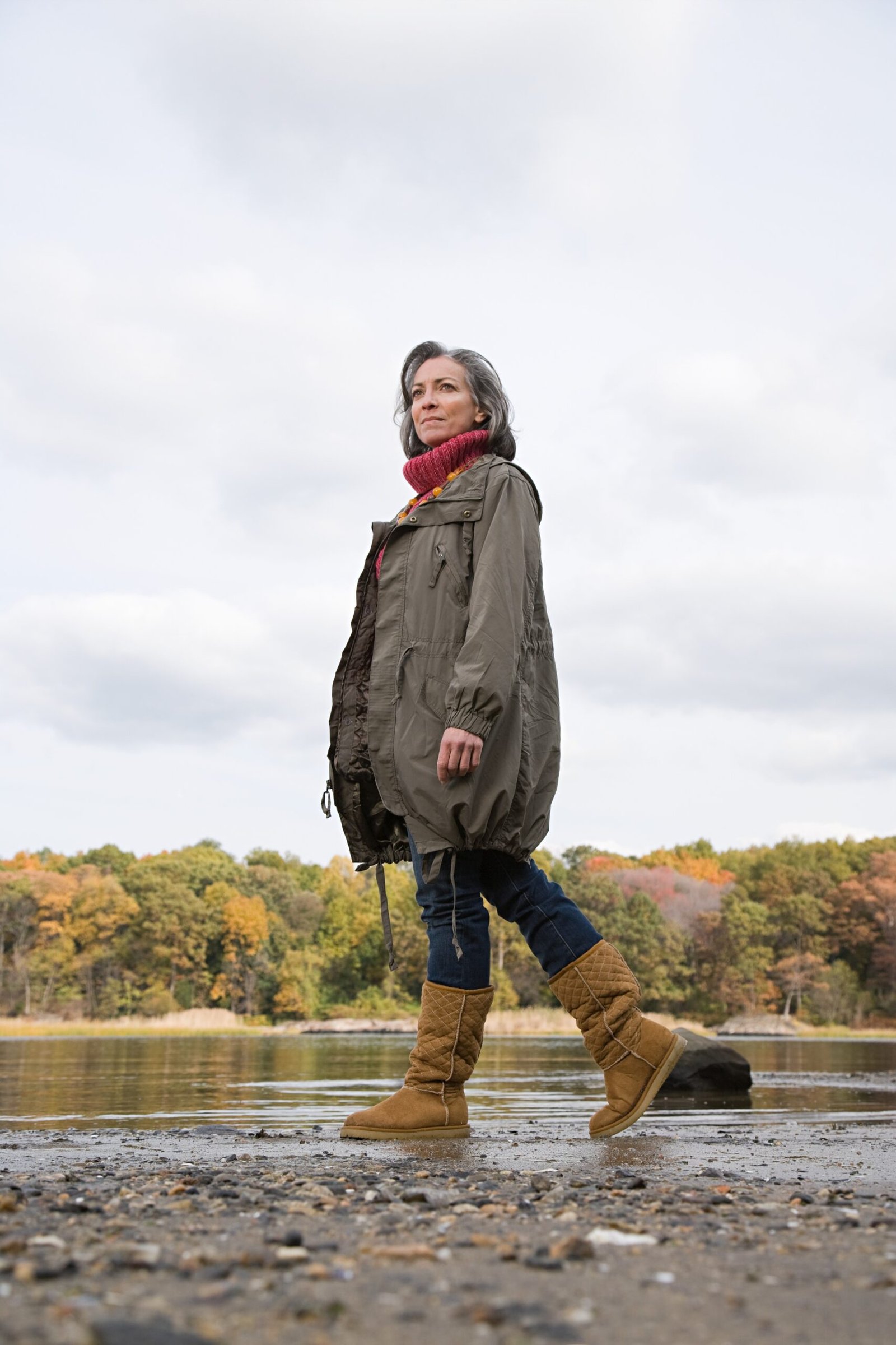 grey zip jacket and red scarf by the lake fall outfit for women over 60