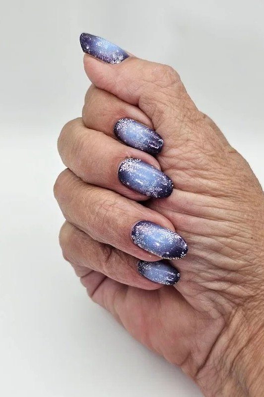 Blue Cat-Eye Almond Nails - winter nail trend for older women over 70