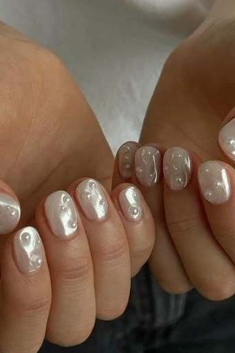Silver Chrome Short Oval Nails - pearl finish nail idea for women over 60