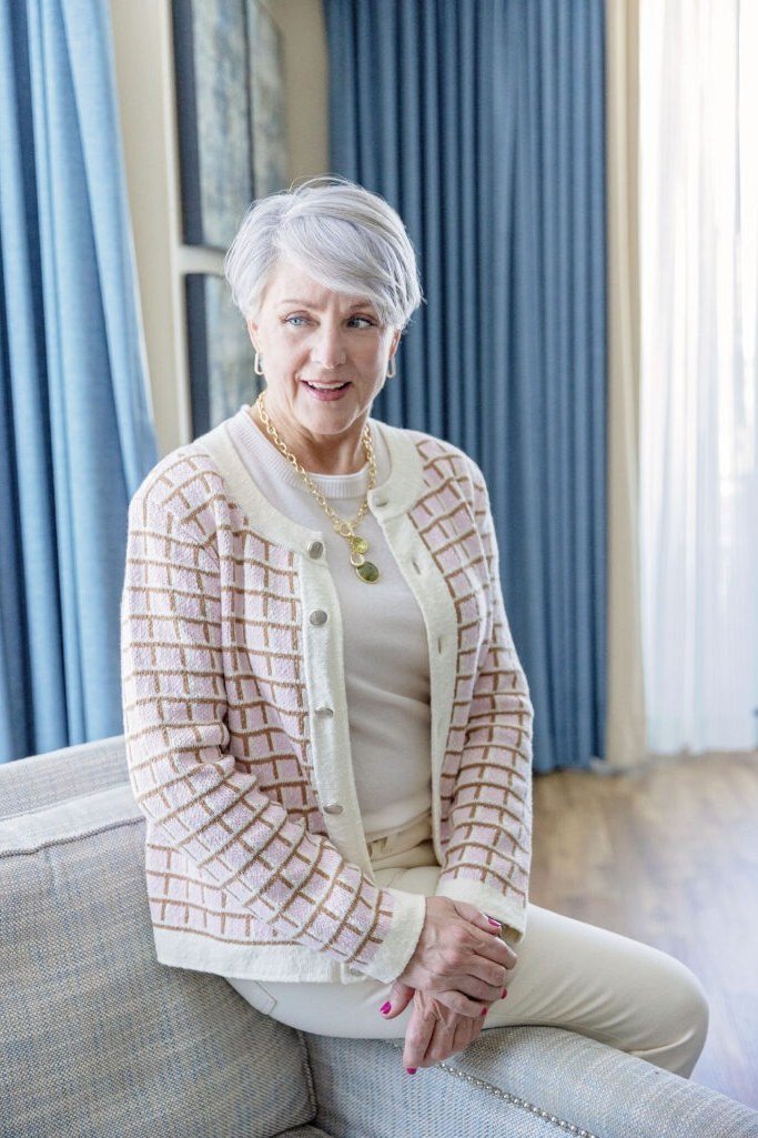 Checkered cardigan with white outfit for women over 70