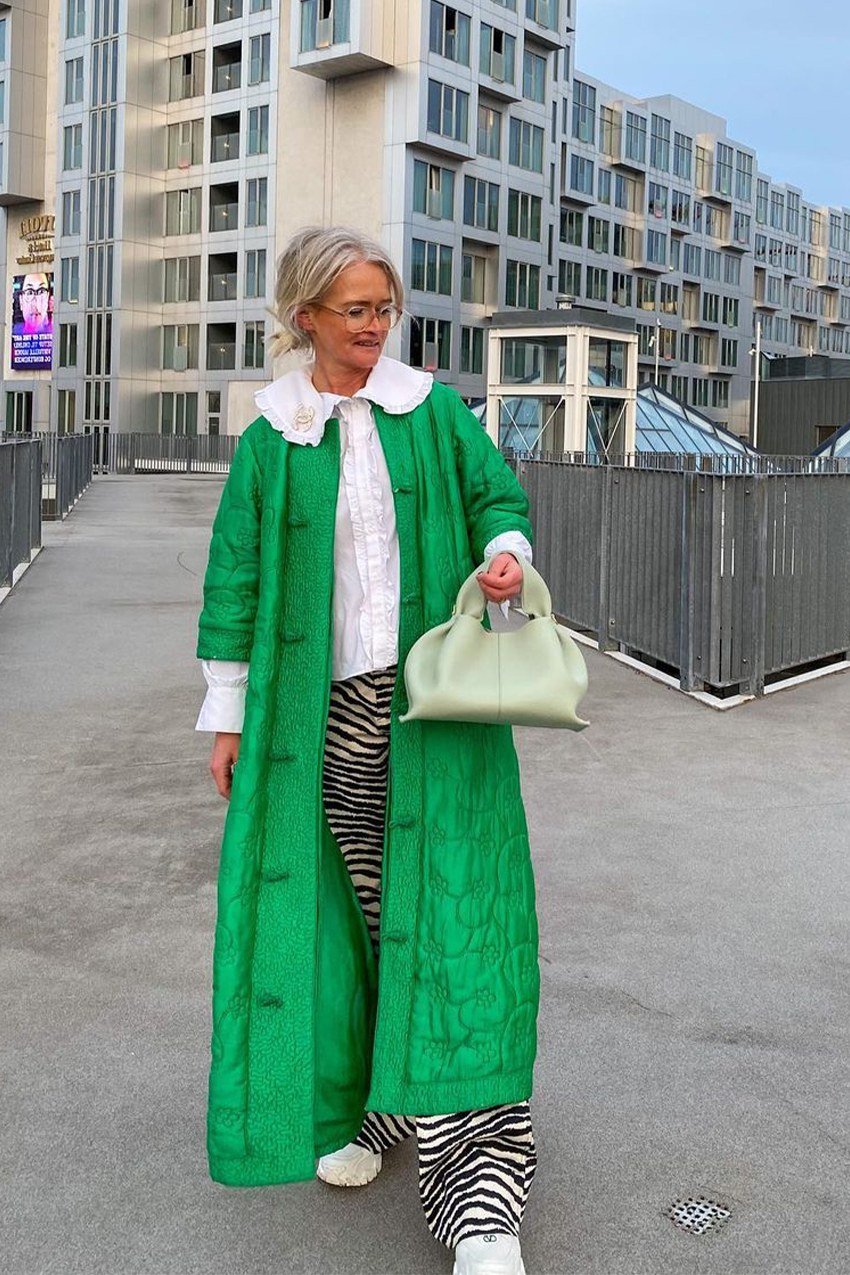 kelly green long wool coat with zebra trousers church outfit for women over 60