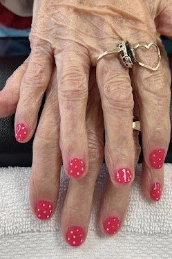 Red Nails with White Polka Dots, nail color idea for women over 60